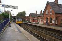 The station building at Urmston is no longer in railway use but is now a pub/restaurant 'The Steamhouse'. On the left a Northern Class 142 departs on the Hunts Cross to Oxford Road shuttle service on 20 October 2017.<br>
Returning to the building on the westbound platform I was tempted to pay a visit because of the delightful smell coming from the kitchen but unfortunately on this occasion I had already eaten!<br><br>[John McIntyre 20/10/2017]