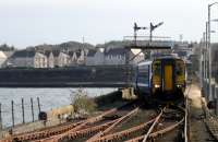 The 12.53hrs arrival at Stranraer Harbour on 26th October 2017. The signal box is switched out and all track, except to Platform 1, is very rusty indeed.<br>
<br><br>[Colin Miller 26/10/2017]