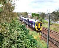 A morning service from Tweedbank approaches its penultimate stop,<br>
Brunstane, on 30th October 2017. The 158 is still in First Scotrail livery, nine<br>
years after the saltire one was introduced. Meanwhile signal EP (Edinburgh<br>
Portobello) 604 says No, which is immensely reassuring.<br>
<br><br>[David Panton 30/10/2017]