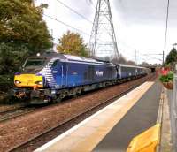 68 007 Valiant on the 'Sub' opposite Brunstane station on 30th October 2017. This is the first of two ECS workings to Motherwell, returning the stock from morning Fife locals. They will return in the afternoon to take the commuters back. This does seem an excessive distance for 8 daily workings, Monday to Friday. I am assuming the reason is economic; it certainly can't be environmental.<br>
<br><br>[David Panton 30/10/2017]