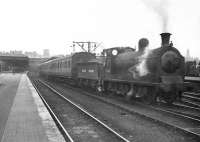 Ex-Caledonian 0-6-0 57630 prepares to take a local out of Buchanan Street in July 1949. <br><br>[G H Robin collection by courtesy of the Mitchell Library, Glasgow 04/07/1949]
