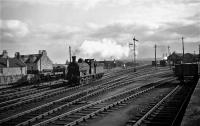 General view with ex NBR Class J36s 65251 and 65267 on 21/09/60. The view is of the carriage sheds to the south of Dyce station, viewed from just outside the station.<br><br>[David Murray-Smith 21/09/1960]