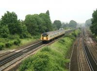 A Connex South Eastern EMU takes the Quarry Line south from Stoats Nest Junction in June 2002. <br><br>[Ian Dinmore 18/06/2002]