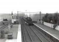 BR Standard tank 80121 entering Tillynaught Junction on 18 August 1960 with a train destined for Elgin via the coast.   <br><br>[G H Robin collection by courtesy of the Mitchell Library, Glasgow 18/08/1960]