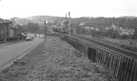 A Cravens DMU passing Pollokshaws North signal box, decommissioned, at the bridge over Haggs Road in 1974.<br><br>[Ian Millar //1974]