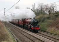Despite the severe weather closing many lines in the UK <I>The Pennine Limited</I> steam excursion from Carnforth to Sheffield ran on 3rd March 2018. However, instead of the anticipated double-headed 45407 and 45690, the train was entrusted to 45699 <I>Galatea</I> with diesel support on the rear. Seen here passing the St. Heliers footbridge on the outward leg.  <br><br>[Mark Bartlett 03/03/2018]