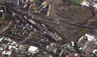 Aerial view of the former South Side station (centre) later the Gushetfaulds container depot. Eglinton Street station was bottom left, Gorbals Junction top left and Larkfield Junction is bottom right. Clearly a Rutherglen to Gorbals spur could be put in.<br><br>[Ewan Crawford //]
