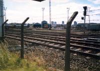 An 08 shunts the Cowlairs Carriage sidings. CGU and Sighthill Branch in foreground.<br><br>[Ewan Crawford //1987]