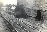D49 4-4-0 no 62704 <I>^Stirlingshire^</I> photographed leaving the tunnel shortly after departure from Queen Street with a Fife bound train on 20 April 1954.
