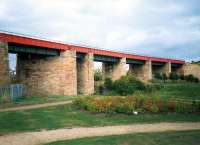 This mammoth viaduct carried the line from Whifflet to Airdrie CR. By the time of the photograph it only carried the line to BSC Imperial works. Today it is a cyclepath.<br><br>[Ewan Crawford //1987]